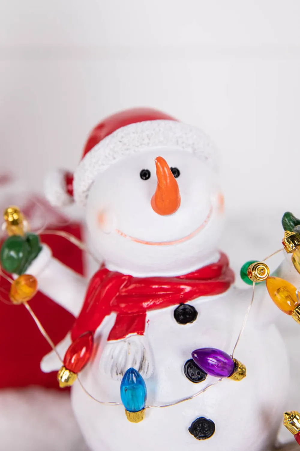 Decorator's Warehouse 7.4” B/O Lighted Resin Skiing Snowman with Light String > Christmas Decor|Christmas Accents