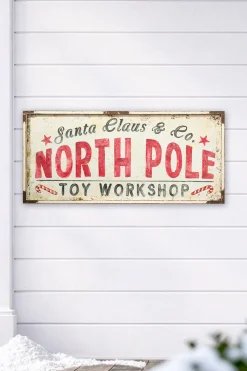 Decorator's Warehouse 22" x 48" North Pole Metal Framed Wall Decor > Farmhouse|Christmas Accents
